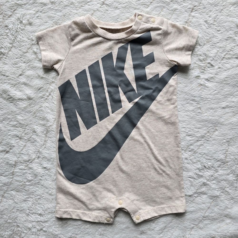 Nike Romper, 6 months, beige with grey writing.